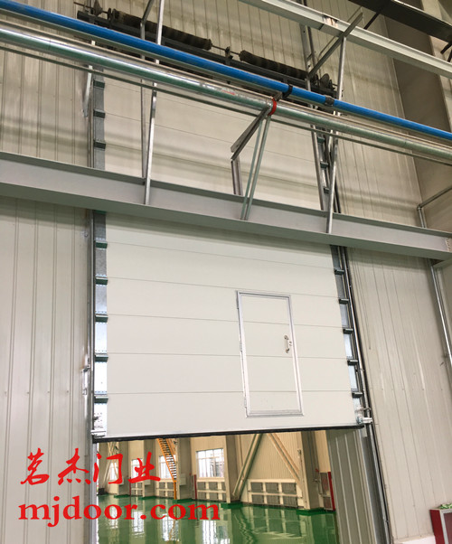 门业图片-工业提升门电动提升门 工业提升门 厂房提升门厂家选任丘茗杰门业客户要求图片