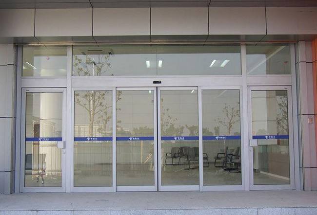门业图片-玻璃门天津市供应 感应玻璃门 玻璃平开门200图片