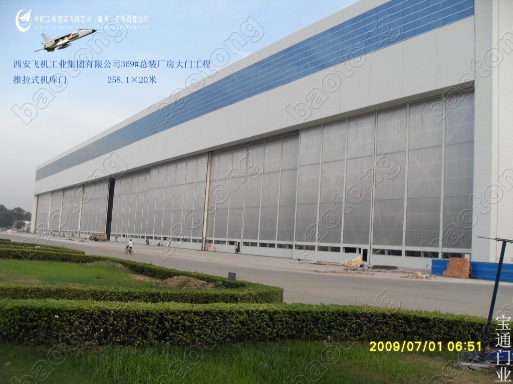门业图片-超大门供应超大门 沈阳宝通门业024-23786011/机库门/柔性升降大门非标图片